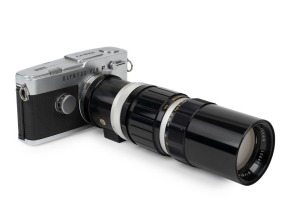 OLYMPUS: Olympus Pen FT half-frame SLR camera [#317899], c. 1967, with rare Zuiko Zoom 100-200mm f5 lens [#106452].