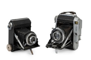MINOLTA: Two vertical-folding cameras - one 1935-type Semi Minolta I with Coronar 75mm f4.5 lens [#71100] and Crown shutter, and one Auto Semi vertical-folding camera [#8972], c. 1937, with Promar 75mm f3.5 lens [#51583] and Crown Rapid shutter. (2 camera