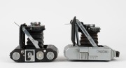 MINOLTA: Two vertical-folding cameras - one 1935-type Semi Minolta I with Coronar 75mm f4.5 lens [#71100] and Crown shutter, and one Auto Semi vertical-folding camera [#8972], c. 1937, with Promar 75mm f3.5 lens [#51583] and Crown Rapid shutter. (2 camera - 4