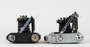 MINOLTA: Two vertical-folding cameras - one 1935-type Semi Minolta I with Coronar 75mm f4.5 lens [#71100] and Crown shutter, and one Auto Semi vertical-folding camera [#8972], c. 1937, with Promar 75mm f3.5 lens [#51583] and Crown Rapid shutter. (2 camera - 5