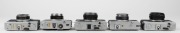 OLYMPUS: Five c. 1970s rangefinder cameras - one Olympus 35 RC [#527703] with E. Zuiko 42mm f2.8 lens and lens cap, one Olympus 35 DC [#253317] with F. Zuiko 40mm f1.7 lens, one Olympus 35 ECR [#190453] with 42mm f2.8 lens, one Olympus 35 ED [#154492] wit - 3