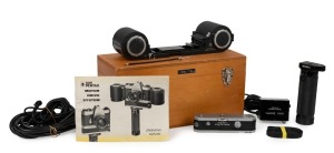 ASAHI KOGAKU: Circa 1968 Asahi Pentax Motor Drive System in custom-built wooden, felt-lined storage box, comprising motor drive unit [#1015564] in chrome, exposure holder camera back [#11192], battery handle grip, power supply unit and two power cables, s