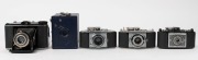 AGFA: Five c. 1930s cameras - one Schulprämie box camera, originally intended as an award to the highest-performing school students in Germany, together with one black-body Isorette with Apotar 85mm f4.5 lens [#658731], one 1937-type black-body Karat 6.3 - 3