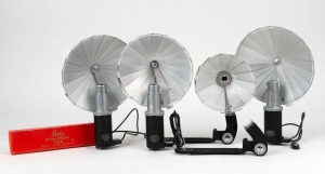 LEITZ: Six accessories - three c. 1950s CEYOO flash units with attached sync cables, one CHICO flash unit, and two CTOOM flash brackets, one in maker's box. (6 items)