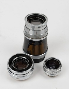 SCHNEIDER-KREUZNACH: Three lenses - one Tele-Xenar 150mm f5.5 with front and rear caps, one Componar 105mm f4.5 with front cap, and one Retina-Curtar-Xenon C 35mm f5.6. (3 items)