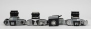 MIRANDA: Four c. 1970s 35mm cameras with front lens caps - one Sensorex, one Sensomat, one Auto Sensorex EE, and one Sensoret with EF-1 flash unit and wrist strap.&nbsp;(4 cameras) - 4