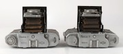 MAMIYA: Two c. 1947 Mamiya-6 IV horizontal-folding cameras - one [#39838] with Zuiko&nbsp;75mm f3.5 lens [#68280] and 'Made in Occupied Japan' engraving on base, and one [#79472] with Zuiko F.C. 75mm f3.5 lens [#208415].&nbsp;(2 cameras) - 4