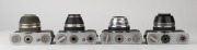 CARL ZEISS JENA: Four early-1960s 35mm cameras - one Werra 1C with Tessar 50mm f2.8 lens [#6726756] and lens cap/hood, one Werra 2 in olive with Tessar 50mm f2.8 lens [#5721003] and lens cap/hood, one Werramatic&nbsp;with Tessar 50mm f2.8 lens [#5926973], and - 3