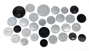 LEITZ: Twenty-seven metal Leica front lens caps of various diameters, together with four metal 39mm body caps. (31 items)