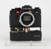 LEITZ: Black Leica R4 camera body and R4 Motor Winder cutaway model, c. 1980, mounted on transparent base with 'Ernst Leitz Wetzlar GMBH' engraving. - 2