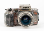 ASAHI KOGAKU: Rare transparent Pentax SFX SLR camera [#3767834], c. 1987, with SMC Pentax-F Zoom 35-70mm f3.5-4.5 lens. - 2