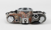 CANON: Partially-transparent Canon AE-1 camera body cutaway model [#209457], c. 1976. - 4