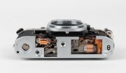 CANON: Partially-transparent Canon AE-1 camera body cutaway model [#209457], c. 1976. - 5