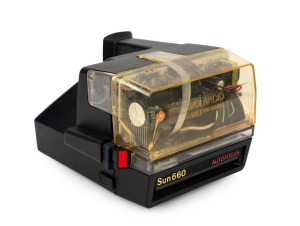 POLAROID: Rare transparent Polaroid Sun 660 instant film camera, c. 1986.