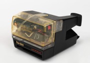 POLAROID: Rare transparent Polaroid Sun 660 instant film camera, c. 1986. - 2