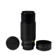 MINOLTA: MD Zoom Rokkor 75-200mm f4.5 lens [#10000000], c. 1989, in lined wooden presentation box with front and rear caps, lens hood, and printed matter. Presented by&nbsp;Kayell Australia to Michael's Cameras to commemorate its 40th year in business. - 2