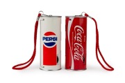 EIKO: Two c. 1980 250ml 'can' cameras with wrist straps in original packaging - one branded Coca-Cola, the other Pepsi. A relic of the&nbsp;'Cola Wars' rivalry.&nbsp;(2 cameras)