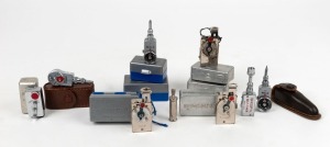 VARIOUS MANUFACTURERS: Thirteen self-timers, most of them in metal, leather, or plastic cases - two Walz Self-Timers, one Pigeon Self-Timer, one Autoknips I, two Autoknips II MKI, three Autoknips II MKII, one Japanese copy of the Autoknips I, one Kopil Self-Timer, one Direkt D.R.H., and one Astron Self-Timer. (13 items)