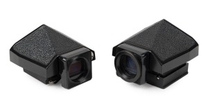 NIPPON KOGAKU: Two black c. 1960s Nikon F type 5 Eye Level Finders, one with bottom cap. (2 items)