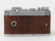 RIKEN: Rare c. 1941 Ricohl Mod. 1 127 film camera [#3600],&nbsp;featuring unusual brown leather covering, with Gokoku Anastigmat 50mm f3.5 lens [#11923]. One of only approximately 1500 believed to have been produced. - 3
