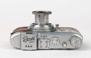 RIKEN: Rare c. 1941 Ricohl Mod. 1 127 film camera [#3600],&nbsp;featuring unusual brown leather covering, with Gokoku Anastigmat 50mm f3.5 lens [#11923]. One of only approximately 1500 believed to have been produced. - 4