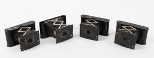 KODAK: Four c. 1910s vertical-folding cameras - one Vest Pocket Model A [#60954], two Vest Pocket Autographic models [#626440 & 725084], and one Vest Pocket Autographic Special [#1608958]. (4 cameras)