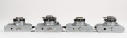 KODAK: Four c. 1940s Kodak 35 cameras - two non-rangefinder models with differing accessory shoes and engraving thicknesses, together with two rangefinder models with differing shutters. The first Kodak 35mm camera to be produced in the United States. (4 - 5