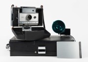 POLAROID: Circa 1969 Polaroid Automatic 350 Land Camera instant film camera with Zeiss Ikon rangefinder and wrist strap, in lined leather case with Polaroid Model 268 flash unit and instruction booklets.