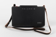 POLAROID: Circa 1969 Polaroid Automatic 350 Land Camera instant film camera with Zeiss Ikon rangefinder and wrist strap, in lined leather case with Polaroid Model 268 flash unit and instruction booklets. - 3