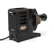 LEITZ: Circa 1939 SIUUB Parvo slide projector, in black metal and Bakelite, with Hektor&nbsp;85mm f2.5 lens and metal lens cap. - 2