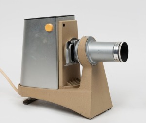 LEITZ: Circa 1950s slide projector, in chrome and tan, with Hektor 85mm f2.5 lens.