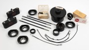LEITZ: Eighteen accessories - one APDOO self-timer, two ELDIA film copiers, one Correx developing tank, two MBOOC booster cells, one OUBIO adapter, one Chico flash unit, four shutter release cables, one VXZOO adapter, one Repro N extension tube element, o