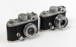 BERNING ROBOT: Two c. 1951 Robot IIa 35mm cartridge cameras - one [#C106383] with Schneider-Kreuznach Xenar 38mm f2.8 lens [#3009355], and one [#J134485] with Carl Zeiss Jena Tessar 3.25mm f2.8 lens [#2028874]. (2 cameras)