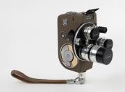 ARCO: Circa 1956 Arco Eight 8mm movie camera [#6148], with ¼"/½"/1½" f1.4 lenses in triple-turret with matching metal lens caps and wrist strap attachment. - 2