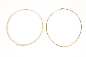 NECKLACES: Two modern 18ct gold necklaces one set with diamonds. 23 grams.