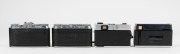 VOIGTL&Auml;NDER: Four cameras in black and chrome - one VF 135 with Color-Skoparex 40mm f2.3 lens, lens cap, and wrist strap, one Bessy AK with Color-Lanthar 38mm f2.8 lens, and two Vito II models with Color Skopar 50mm f3.5 lenses. (4 cameras) - 4