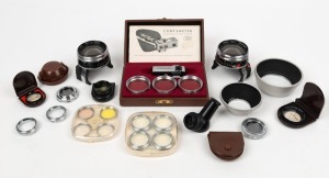 ZEISS IKON: Twenty-three photography accessories, many in plastic cases or leather pouches - one Contax Contameter in leather-lined maker's box with Proxar 20/30/50 lenses and instruction booklet, seven additional close-up lenses with various specifications, three lens hoods, one right-angle viewfinder attachment, two Contaflex Teleskop 1,7x attachments with differing print details, each with matching 861/07 bracket, and seven lens filters. (23 items)