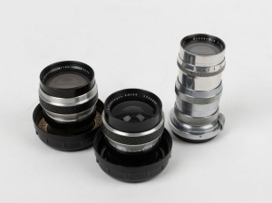 CARL ZEISS: Three lenses - one Sonnar 135mm f4 [#2680027] for Contax rangefinder in maker's box, one Flektogon 35mm f2.8 [#5306880] for Werramatic in plastic dome with lens cap, and one Cardinar 100mm f4 [#6383235] for Werramatic in plastic dome with lens