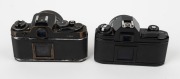 NIPPON KOGAKU: Two c. 1978 black-body SLR cameras - one Nikon FE [#3502232] with Nikkor 50mm f1.4 lens [#2904261], and one Nikon EM [#6711920] with AF Nikkor 50mm f1.8 lens [#2018681]. (2 cameras) - 4