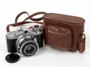 PHOTAVIT: Circa 1947 Photavit&nbsp;viewfinder camera [#5909], with Xenar 37.5mm f3.5 lens [#1890188] and Compur-Rapid shutter, together with lens cap and maker's leather case.