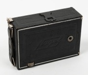 NAGEL: Recomar 18 folding plate camera, c. 1928, with Xenar 105mm f4.5 lens [#438187] and Compur shutter, together with leather case containing black hood cloth, wrist strap, camera back, and six metal film holders. - 3