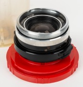 CARL ZEISS: Circa 1970 Carl Zeiss Skoparex 35mm f3.4 lens [#7357262] with Icarex&nbsp;screw mount in maker's plastic dome. - 2