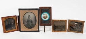 UNKNOWN: Five mid-19th century framed images - one tintype of young woman in petticoat holding umbrella, one tintype of early passenger-laden horse-drawn bus in folded brass frame, one tintype of man and woman with horse-drawn carriage in folded brass frame, one daguerreotype of seated man and woman in leather-bound frame, and one ink-on-glass image of globe, with brass handle enabling the holder to cause ship to 'sail'. (5 items)