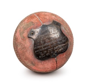 PRESENTATION CRICKET BALL (1927) & THE FIRST TIME BRADMAN FACED GRIMMETT, leather, cork and twin, mounted with a shield-shaped silver plaque, engraved "S.A. v N.S.W. - Dec.1927 - Presented to C.V. Grimmett by S.A. XI in recognition of his brilliant performance with this Ball in 2nd Innings. 8 for 57. 20.12.27."