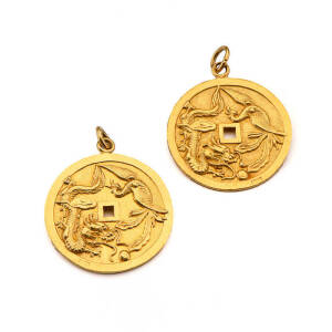 CHINESE GOLD: Two 24ct gold pendants in the form of coins. Combined weight 15.5 grams