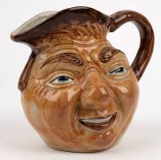 LITHGOW POTTERY face jug in the manner of Martin Brothers, impressed kangaroo mark to base "Lithgow", 15cm high - 6