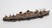 ROBERT RAPSON (New Zealand) painted and glazed ceramic shipping sculptures, (19 pieces), most signed, the ship 42cm long - 3