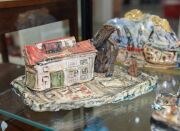 ROBERT RAPSON (New Zealand) painted and glazed ceramic shipping sculptures, (19 pieces), most signed, the ship 42cm long - 9