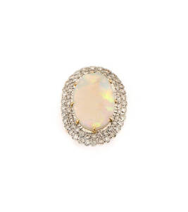 RING: 18ct gold opal and diamond cluster ring.