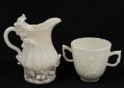 CHELSEA Blanc de Chine strawberry jug and two handled coffee cup, circa 1745, (2 items), impressed triangular mark to the base of the jug, 14cm high - 2